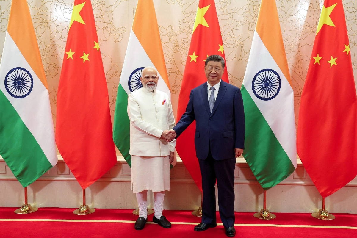 collorau - Xi Jinping e Narendra Modi se reúnem e prometem cooperação